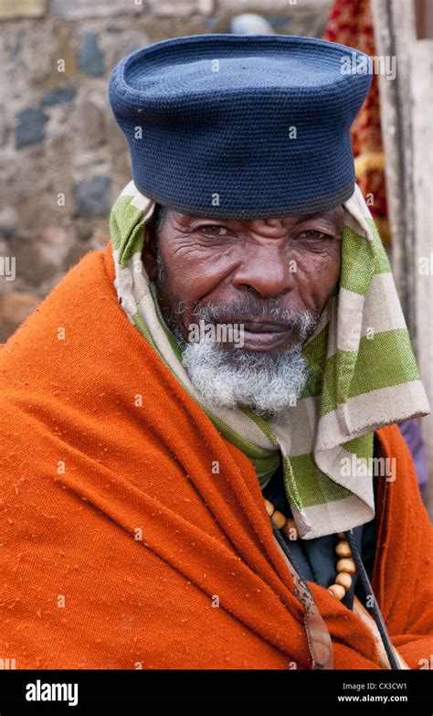 Addis Ababa Ethiopia Africa Old Religious Man Portrait Aged 70 In Orange And Robe In Shero Meda