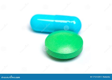 Blue Capsule And Green Pill Royalty Free Stock Images - Image: 17121229