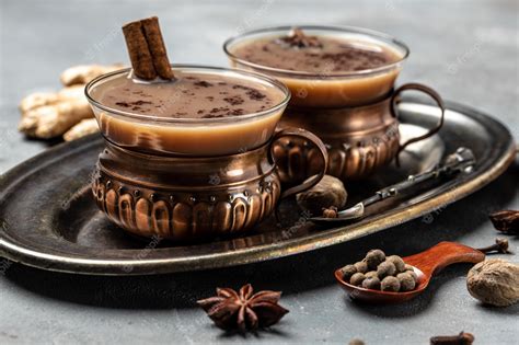 Premium Photo Two Mugs Of Masala Tea Hot Indian Masala Chai Tea With Milk And Spices In A