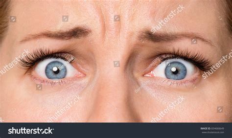 Closeup Scared Face Beautiful Young Woman Stock Photo 654660649