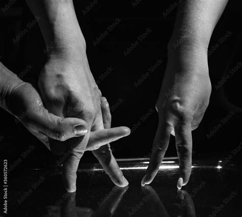 Couple Hands Show The Meeting Of A Sexy Naked Man And An Erotic Nude Woman For Sex Passion And