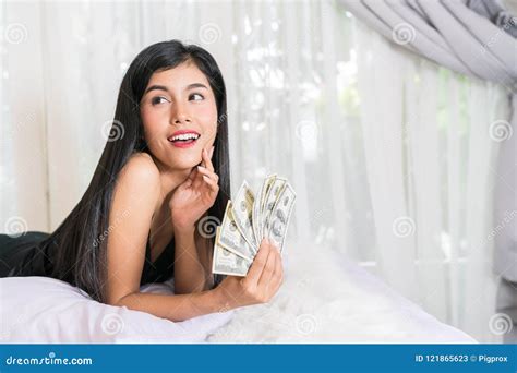 Sexy Female And Dollar Bills Woman With Lot Of Money Millionaire