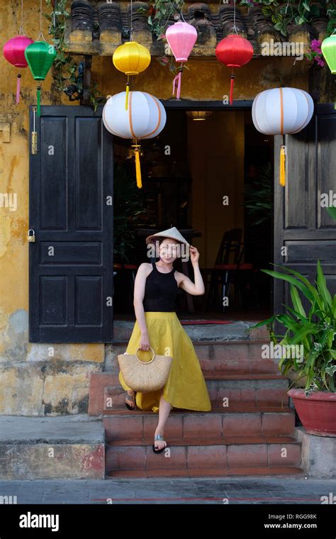 Portrait Of Young Woman Wearing A Traditional Vietnamese Non La Conical