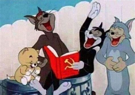 Tom and Jerry cats gathered around laughing at the communist manifesto ...