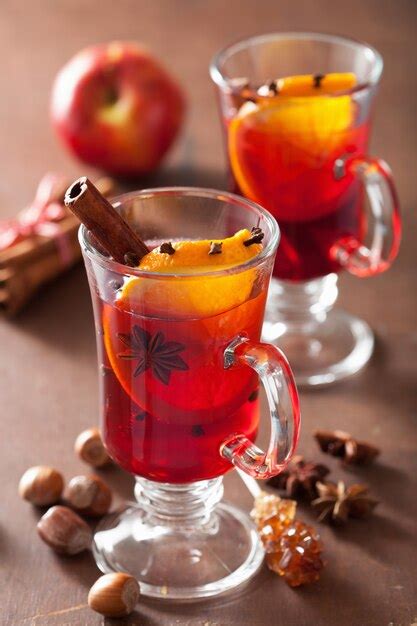 Premium Photo Glass Of Mulled Wine With Orange And Spices