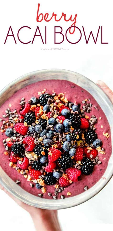 Berry Acai Bowl With Nuts And Berries On Top In A Metal Bowl That Says