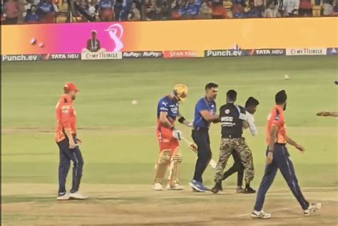 Fan Breaches Security To Meet Virat Kohli During Rcb Vs Pbks Match In