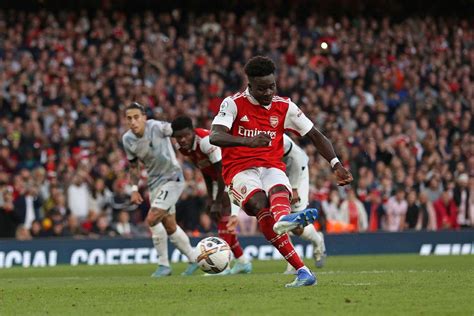 Sakas Penalty Keeps Arsenal Top In 3 2 Win Over Liverpool Chinadaily