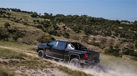 2017 GMC Sierra 2500 HD All Terrain X - Rear Three-Quarter | Caricos