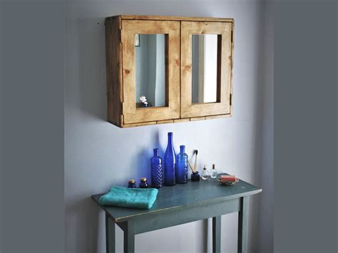 Double mirror door wooden bathroom cabinet - 56 x 70 x 18 cm