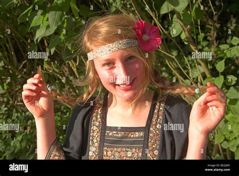 Blonde Hippy Girl Holding Her Plats Stock Photo Alamy