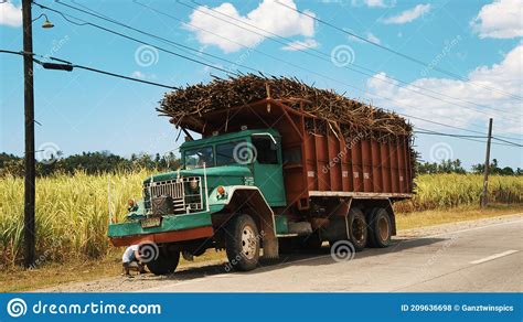 The Sugar Cane Truck Broke Down on the Road Next To the Sugar Cain Field in the Philippines ...