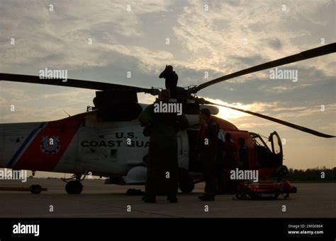 Aircrafts - HH-60 Jayhawk - 26-HK-53-74. Personnel on ramp with HH-60 ...