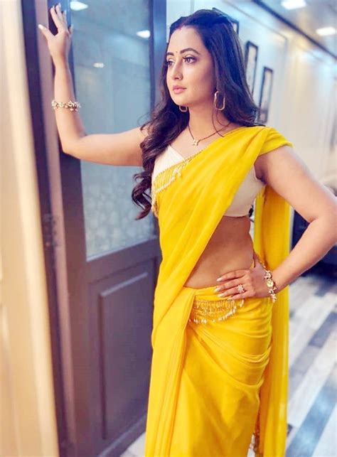 Naagin 4 Fame Rashami Desai Looks Hot In Sheer Yellow Saree