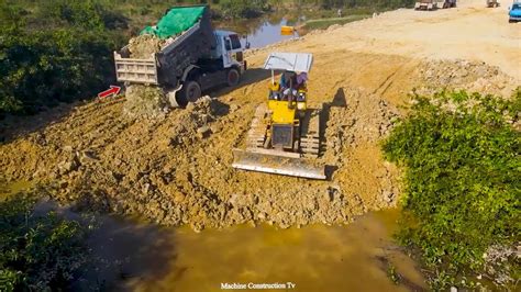 Bulldozer Komatsu D P And Amazing Bulldozer D P With Many Dump Trucks