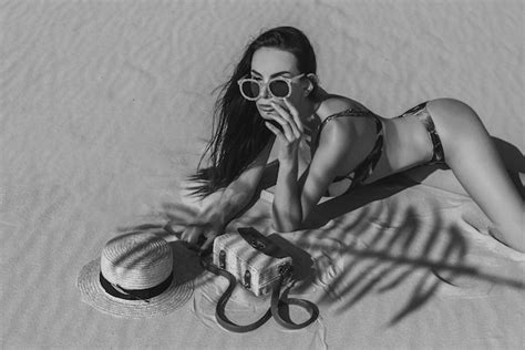 Premium Photo Sexy Girl In The Sand In A White Bikini