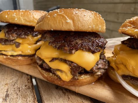 Smash Burger Triple Stacked With Cheese And A Brioche Bun R Foodporn