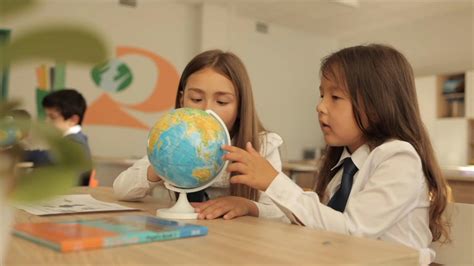 students studying globe  school  stock video