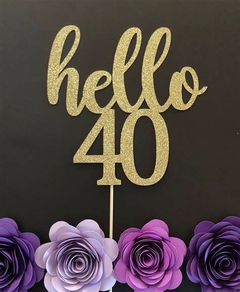 A Cake Topper That Says Hello 40 With Purple Flowers