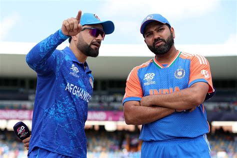 Rashid Khan Makes A Point To Rohit Sharma At The Toss