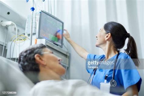 Nurse Taking Vital Signs Photos And Premium High Res Pictures Getty