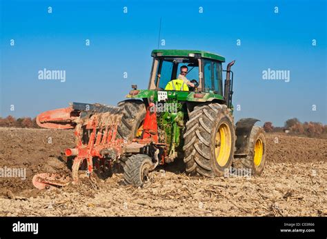 John Deere Tractor With Kuhn Up And Over Reversible Plow France