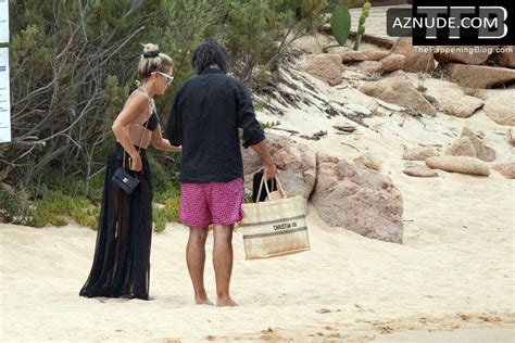 Sylvie Meis Sexy Seen Flaunting Her Hot Figure Wearing A Bikini Top At The Beach In Sardinia