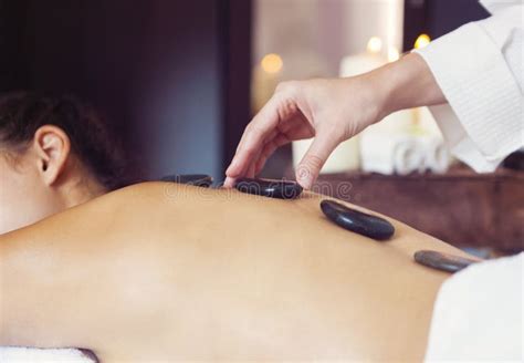 Hot Stone Massage Therapy Spa Treatment Stock Photo Image Of Calm