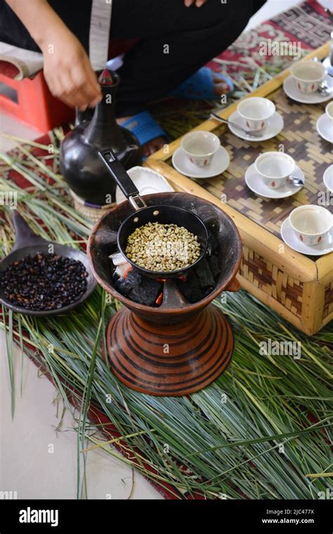 Roasting coffee beans in a traditional Ethiopian coffee ceremony Stock ...