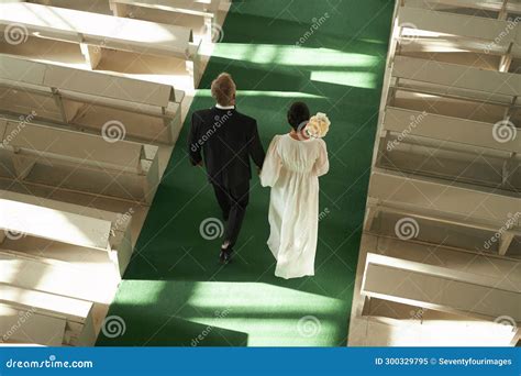 Senior Couple Walking Down Aisle In Church During Wedding Ceremony Stock Image Image Of Walk