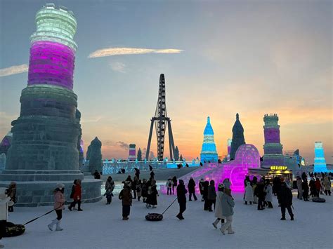 Photos: China's 'ice city' Harbin draws record tourists over New Year ...