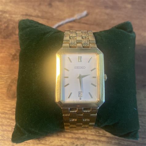 Seiko gold square tank watch I personally love date... - Depop