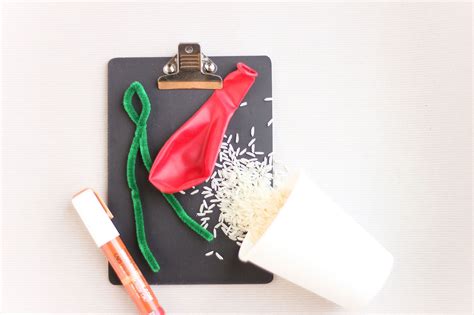 A Clipboard With Some Food On It Next To A Pen And Paper Cup Filled