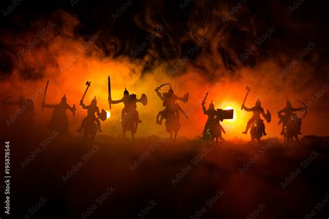 Medieval battle scene with cavalry and infantry. Silhouettes of figures ...