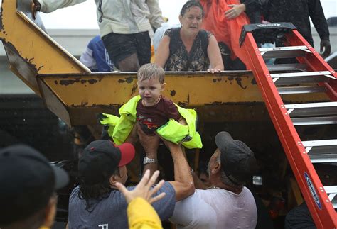 Photos People And Pets Continue To Evacuate From Flood Waters Mpr News