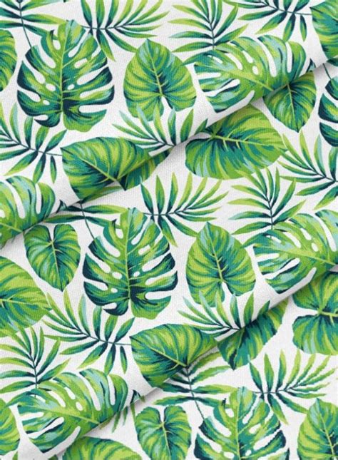 A Green And White Tropical Leaf Print Fabric