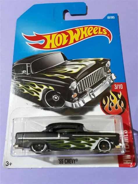 A Black Hot Wheels Car With Flames On It S Hood And The Number 55 Chevy