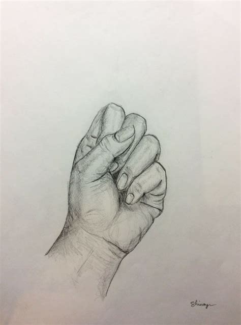 a pencil drawing of a hand holding something