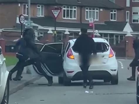 Moment Masked Gangs Armed With Machetes And Baseball Bats Brawl In