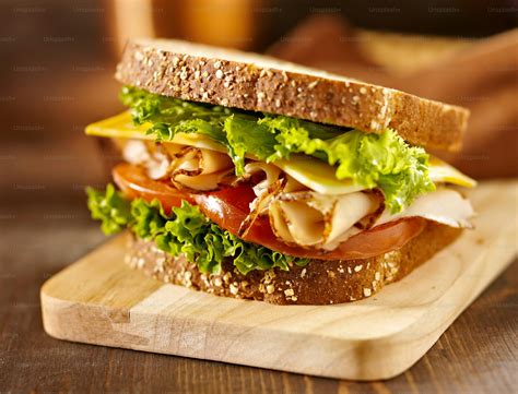 Close up photo of a deli meat sandwich with turkey photo – Leaf Image