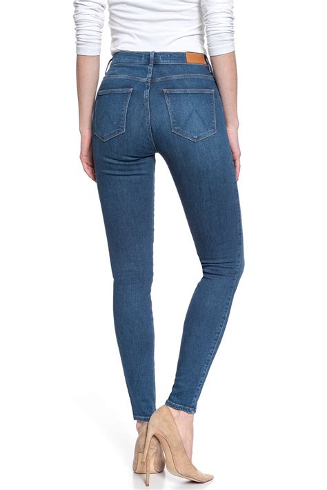 DAMSKIE SPODNIE JEANSOWE WRANGLER HIGH RISE SKINNY MID INDIGO W27HVQX8E