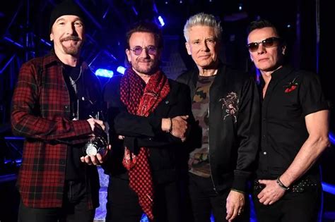 U2s Adam Clayton Rubbishes Rumours Larry Mullen Wont Go On Tour With