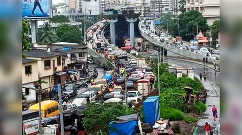 Mumbai Rains Heavy Downpour Lashes City Imd Issues Red Alert