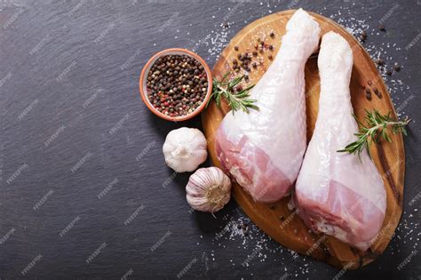 Premium Photo Fresh Turkey Meat With Rosemary And Spices Top View