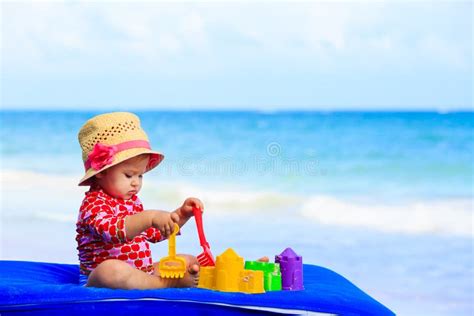 Cute Little Girl with Sand Toys on the Beach Stock Photo - Image of ...