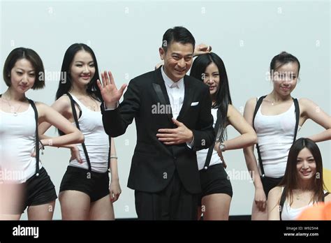 Hong Kong Singer And Actor Andy Lau Third Left Waves At A Press