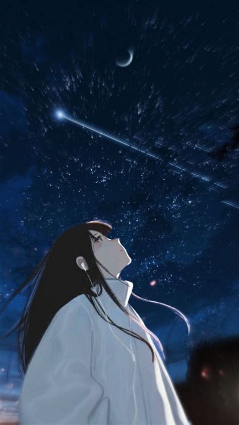 a woman looking up at the stars in the night sky with her head tilted back