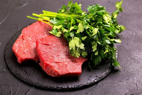 Fresh Raw Beef Tenderloin And Marbled Steaks With Seasoning Stock Image