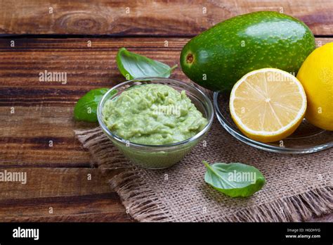 avocado guacamole sauce with ingredients, traditional Mexican dip and ...