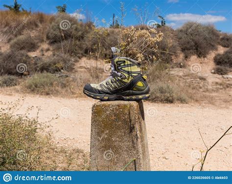 Old Boot Left By A Pilgrim In Camino De Santiago Way Of Saint James